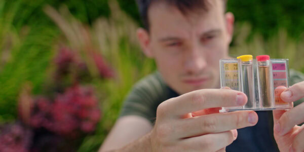 technician examining water